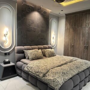 Ford Bed side view — quilted upholstered frame, delivered client bedroom Islamabad | IKON Home GT